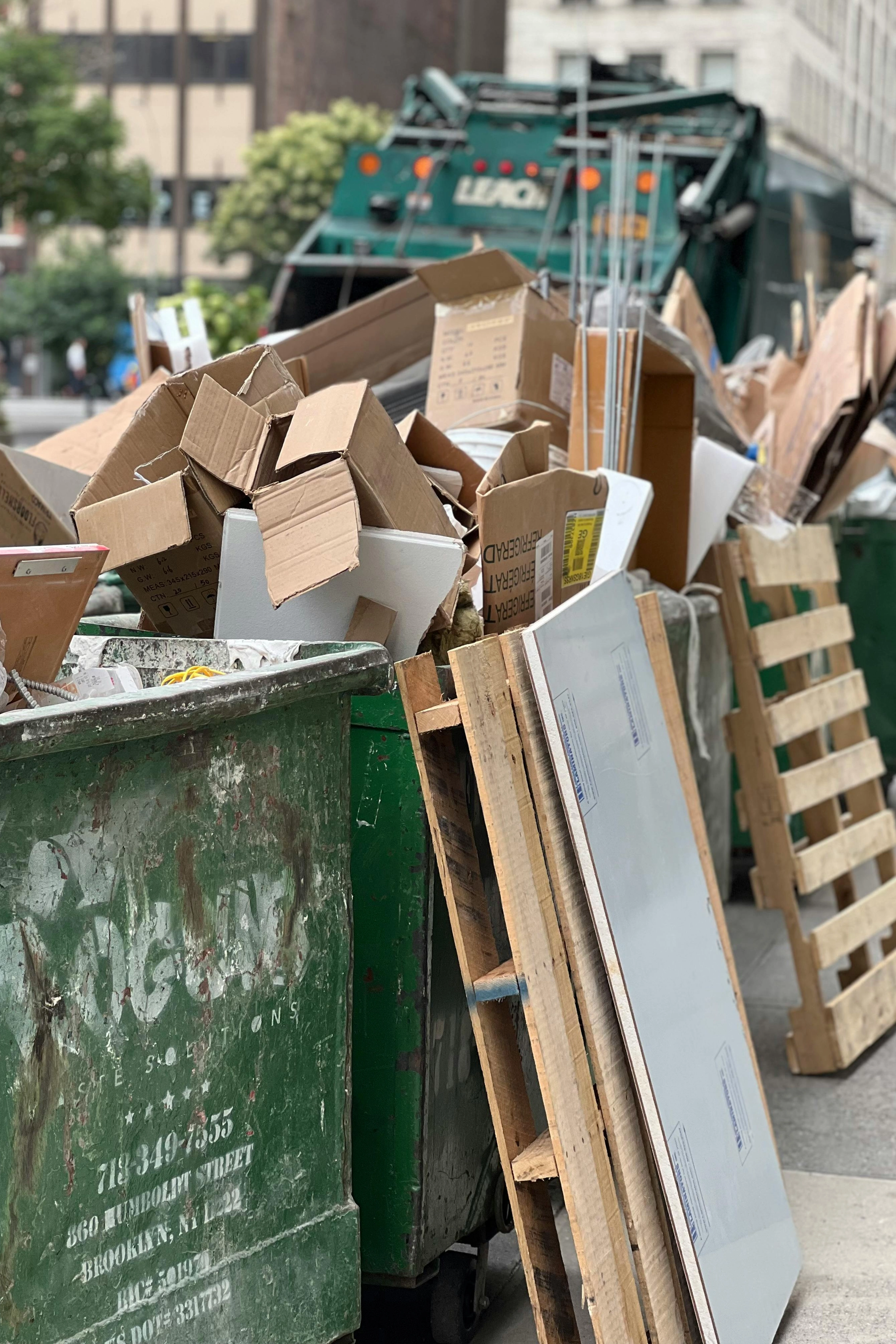 Property cleanup crew hauling debris in Northeast Alabama